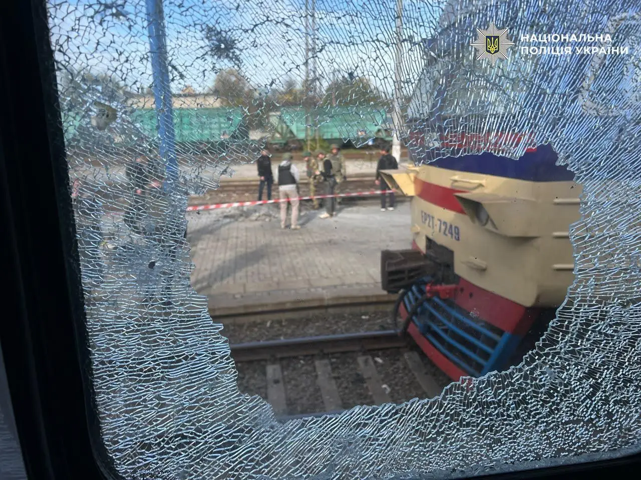 Broken window and train at Dnipro station in an official Ukrainian police photograph