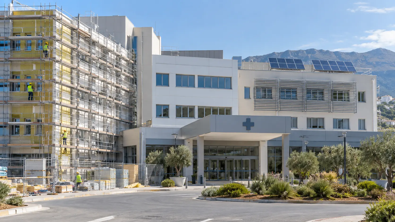 Hospital building undergoing an energy-efficiency upgrade with rooftop solar panels