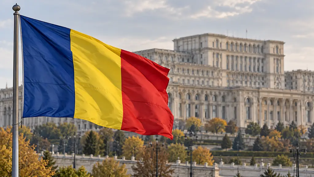 Romanian blue, yellow and red flag in front of parliamentary architecture